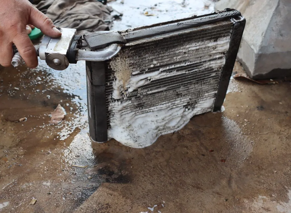 Cleaning an air conditioner condenser
