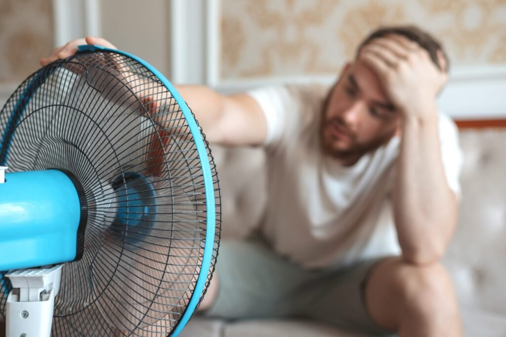 why is my ac blowing hot air